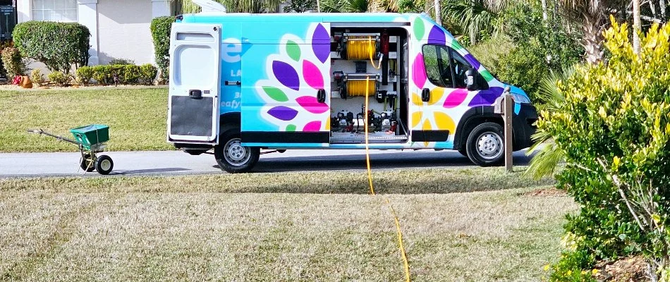 Colorful work van on a property in New Smyrna Beach, FL.