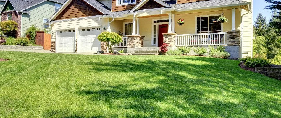 Mowed lawn on residential property in New Smyrna Beach, FL.