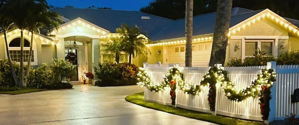 Home with holiday lights on a property in New Smyrna Beach, FL.